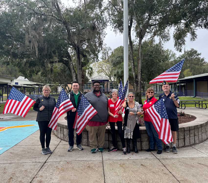 American Legion Auxiliary Unit 99 donates American flags to elementary school